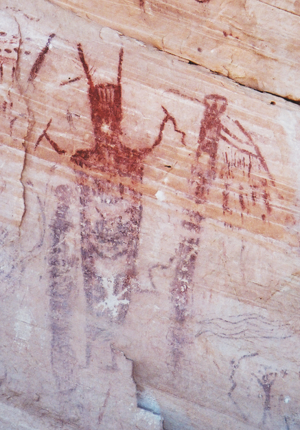 Archaic anthropomorphic figures, one holding a flute.