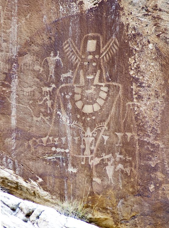 Large Fremont figure with a headdress pecked over earlier figures