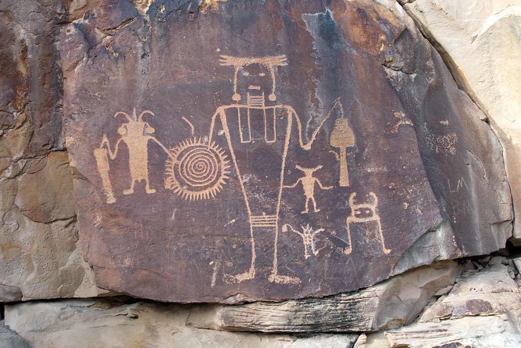 Fremont warrior with a spiral shield, among smaller figures and animals