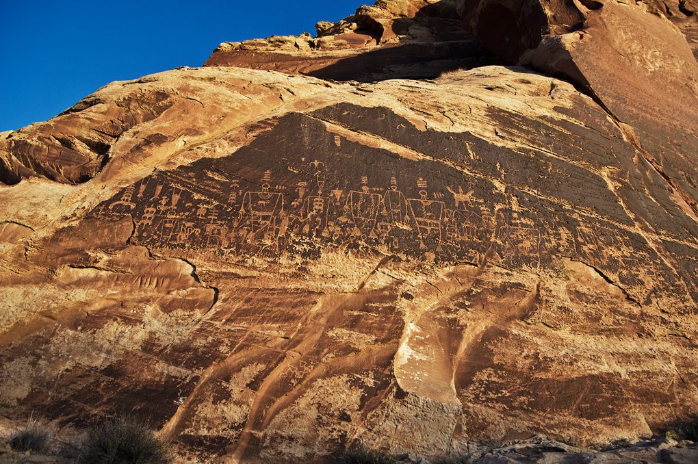 Large Basketmaker petroglyph panel on a cliff above the San Juan River