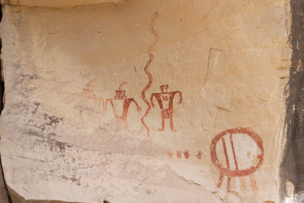 Fremont painted figures with a snake, small handprints and a round shield